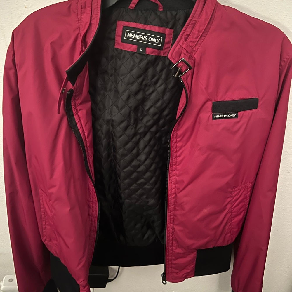 Gently warn Member’s Only jacket